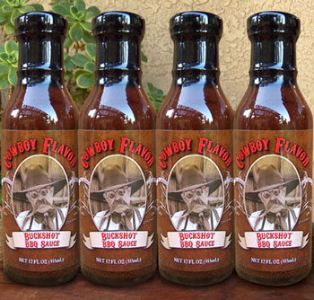 four 12 oz bottles of Buckshot BBQ Sauce