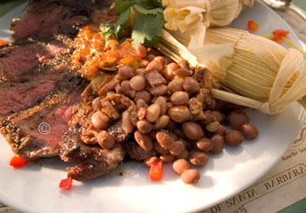 plate with beef, beans and tamale